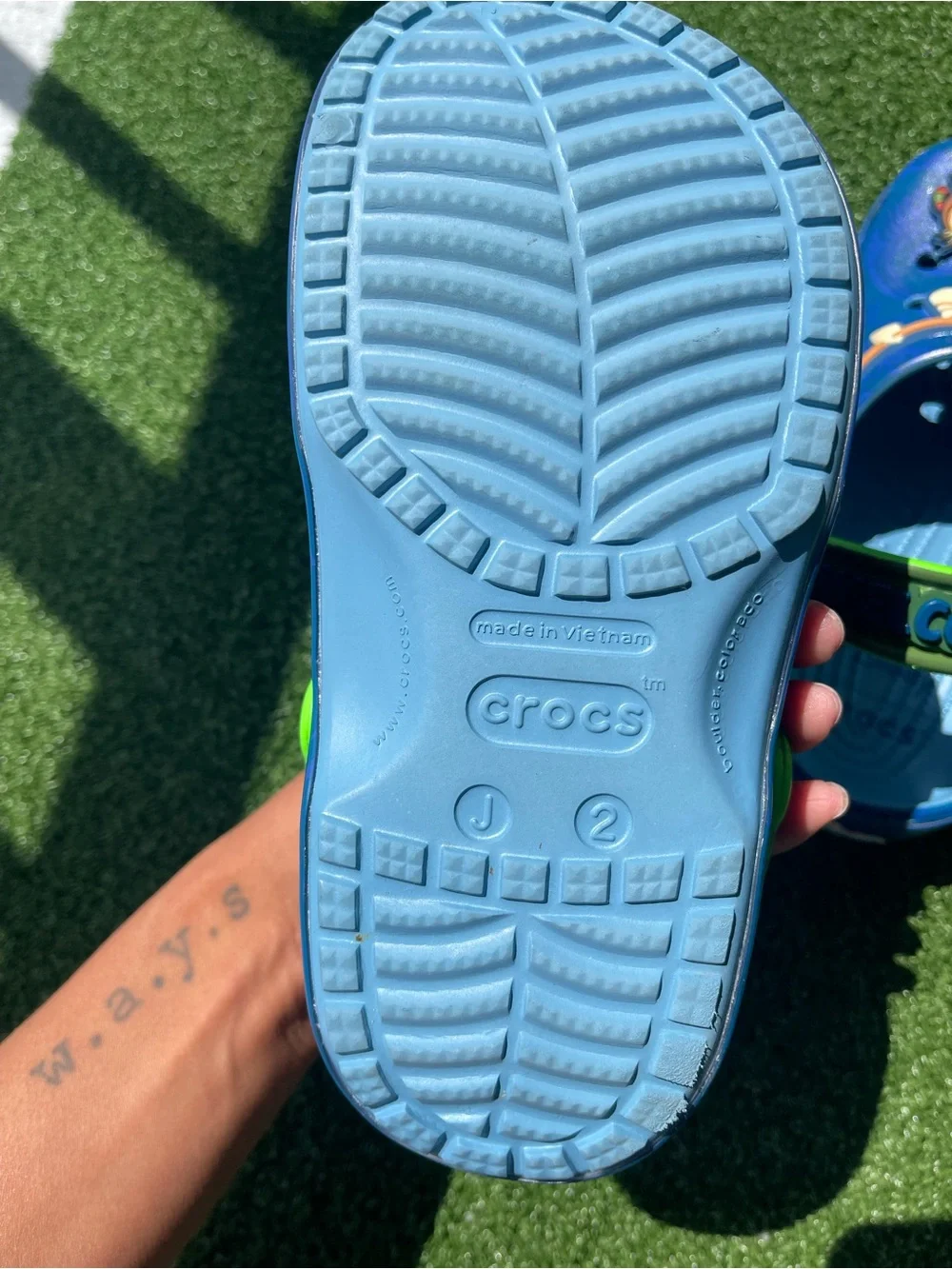 CROCS Moana Kids Blue Clog with Neon Green Strap and Ocean Charm Accents